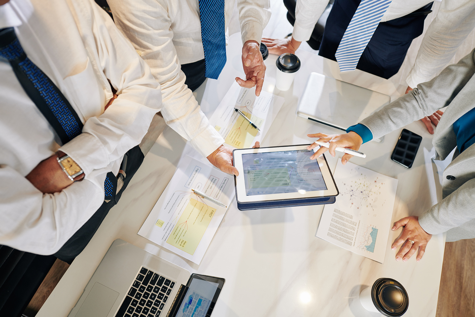 Business people discussing marketing plan Business people discussing marketing plan